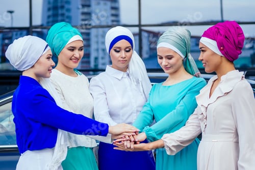 Preview: a group of five young and attractive, business women