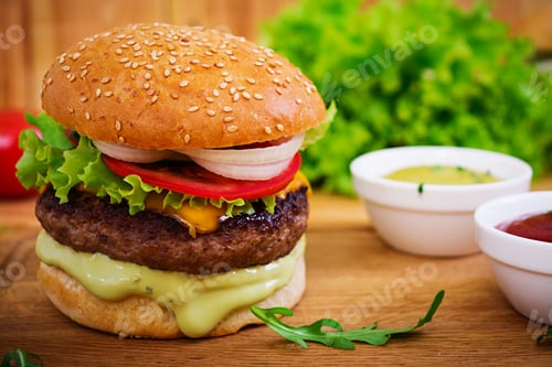 Preview: Delicious handmade burger on wooden background. Close view