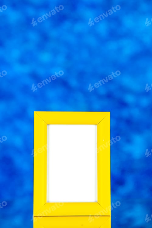 Preview: front view yellow picture frame on blue background color shoot picture gift present portrait family