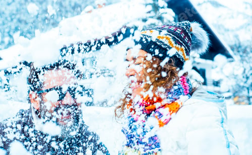 Preview: Funny leisure activity in winter with snow. Happy people have fun playing with snowball and snowfall