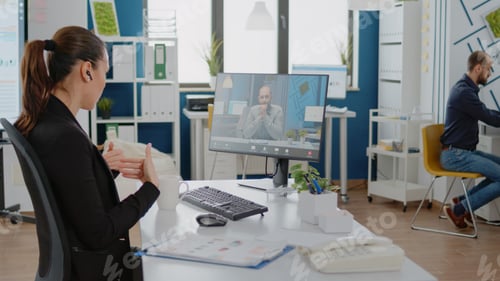 Preview: Woman talking to boss on video call communication