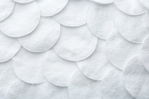 Preview: Many cotton pads as background, top view