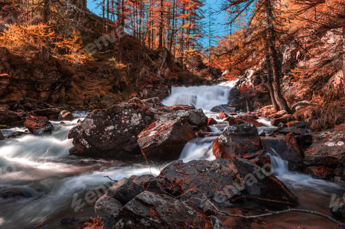 Preview: Beautiful view of the autumn landscape and a waterfall in a forest