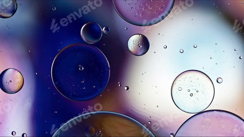 Preview: Abstract Colorful Food Oil Drops Bubbles and spheres Flowing on Water Surface