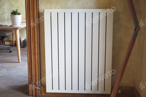 Preview: White radiator on grey white wall. apartment heating installation system,