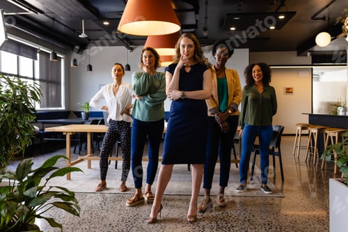 Preview: Portrait of diverse female colleagues in casual meeting in office