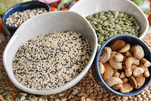 Preview: Close-up, a bowl of chia seeds and other healthy foods on the kitchen table.