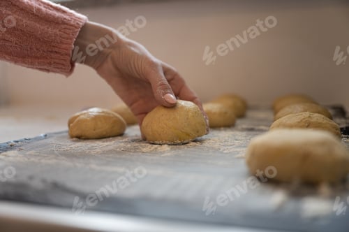 Preview: Sourdough balls rising on floured surface