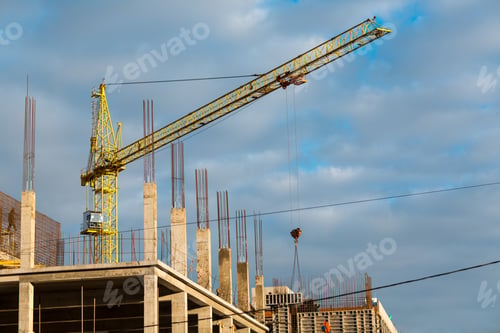Preview: Building construction house with crane concept. Blue sky background.