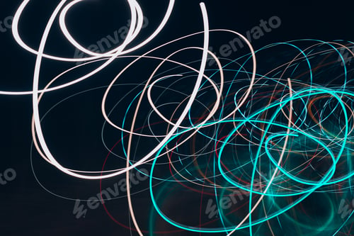 Preview: Abstract bright blue-white lights in motion. Long exposure image