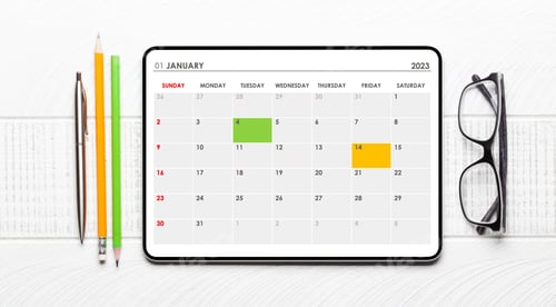 Preview: Tablet with calendar app, eyeglasses and office supplies