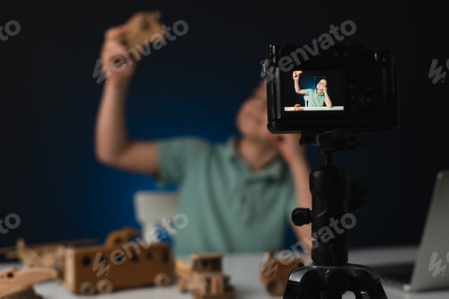 Preview: Young boy video blogger making stream with his followers