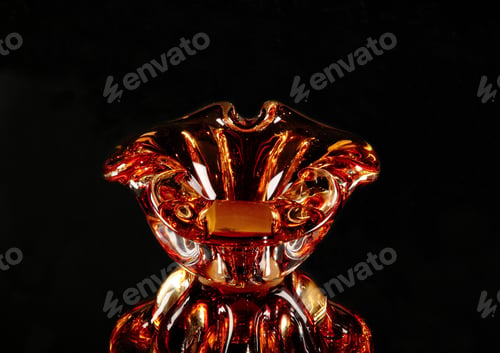 Preview: beautiful yellow ashtray is empty on black