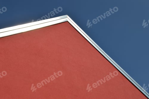Preview: Red building wall against blue sky