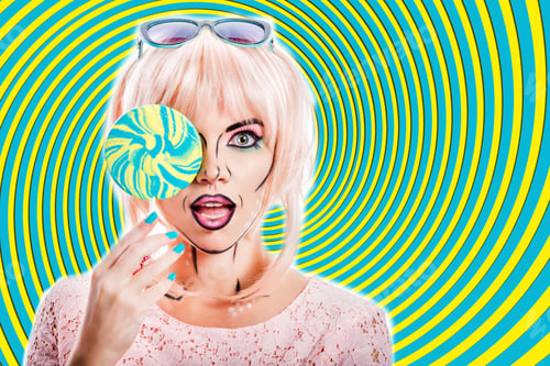 Preview: Girl With Creative Makeup In The Style Of Pop Art Holding Lollipop And Hides Her Face Behind Candy
