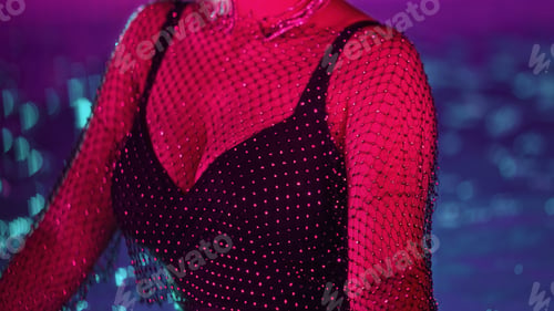 Preview: Unrecognizable glamorous woman pool water party under neon glowing, sexy outfit
