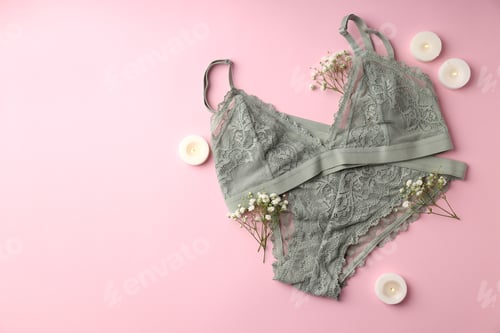 Preview: Concept of women's clothes with underwear on pink background
