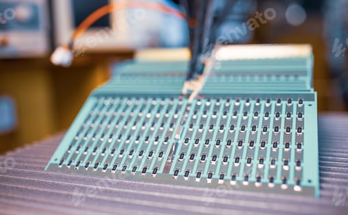 Preview: Close-up side view of a panel of SMD resistors