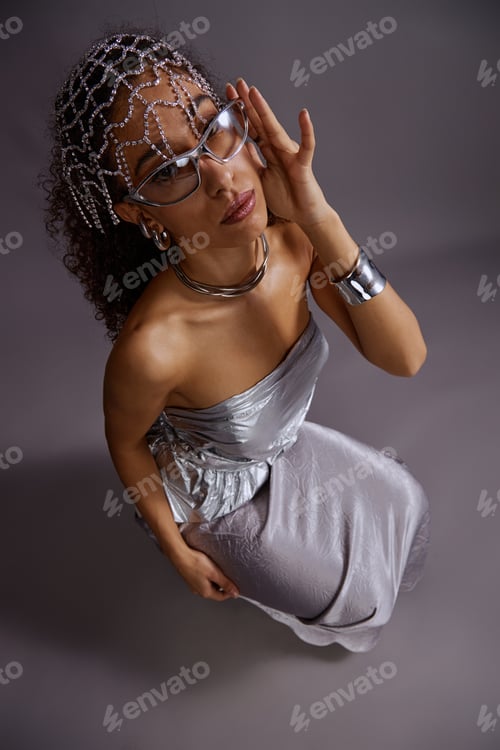 Preview: Portrait of Young Woman Wearing Accessories Posing Confidently