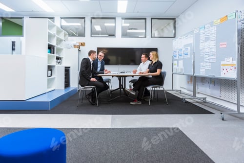 Preview: Business people having a meeting in conference room