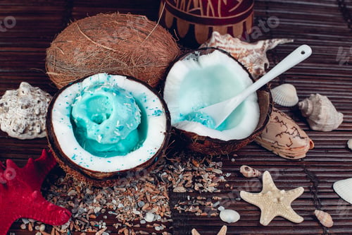 Preview: Blue ice cream in coconut bowl. Summer vacation