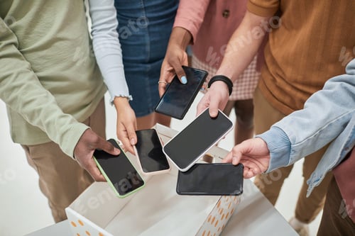 Preview: Students putting phones in box closeup