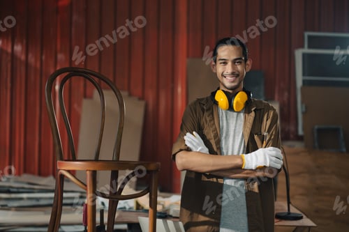 Preview: Portrait Young Asian man Carpenter in carpentry workshop