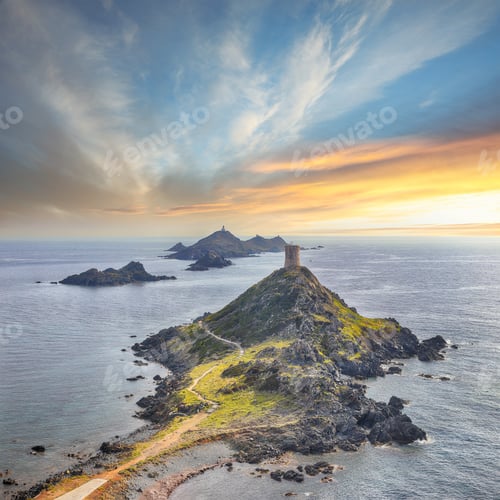 Preview: Sunset over popular tourist destination Torra di a Parata with Genoese Tower