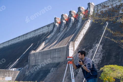 Preview: Blue collar worker is working at the dam.