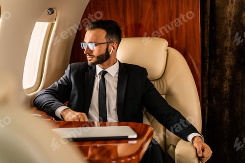 Preview: Businessman flying on private jet