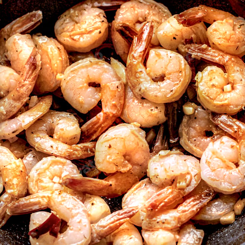 Preview: Gambas al ajillo prawn-based dish close up photography
