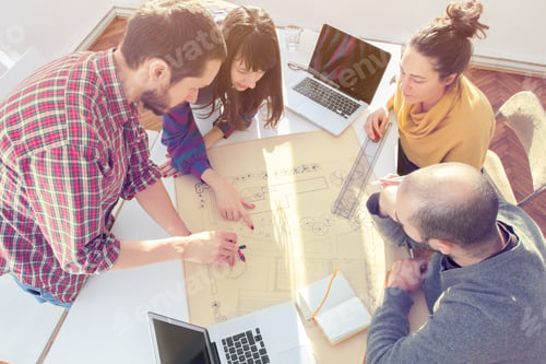 Preview: Young Group Of People/Architects Discussing Business Plans.