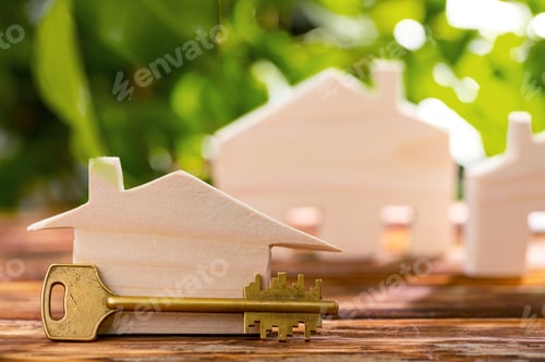 Preview: Wooden toy house and house keys close up