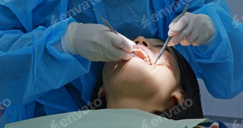 Preview: Woman having dental treatment in clinic