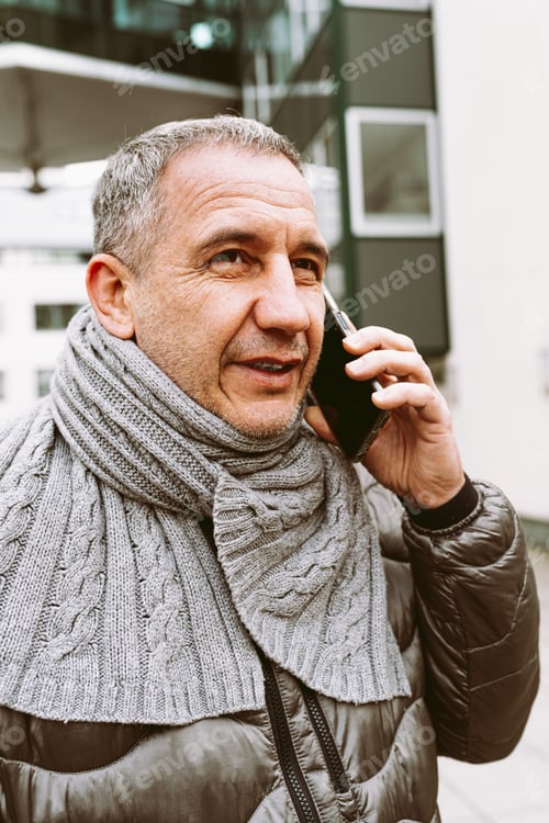 Preview: Portrait man talking smartphone