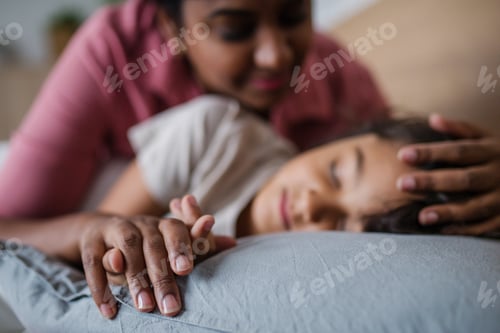 Preview: Mother taking care of her ill son at home