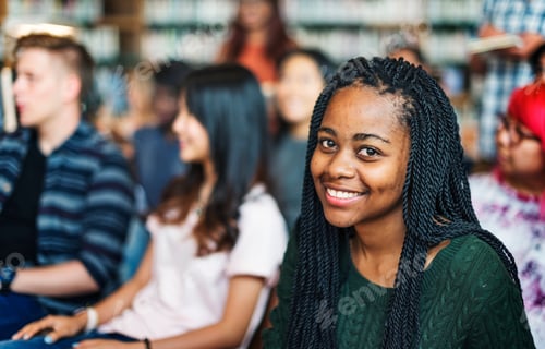 Preview: Happy student at the library