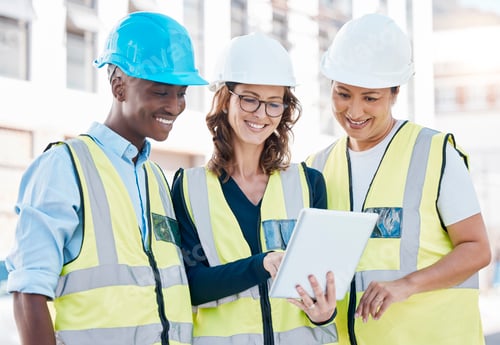 Preview: Architect, team and tablet in city construction for building inspection, collaboration or idea for