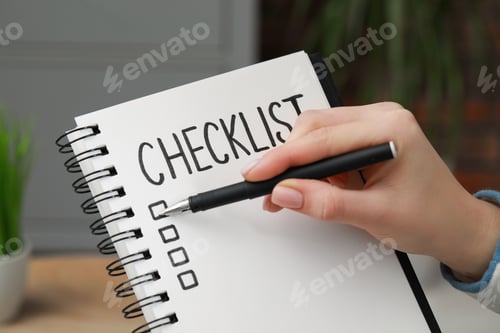 Preview: Woman filling Checklist with pen indoors, closeup
