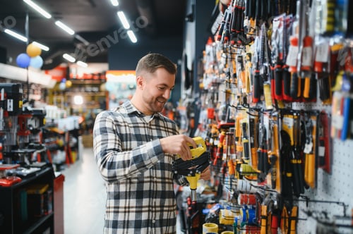 Preview: Portrait of mature man standing in hardware store