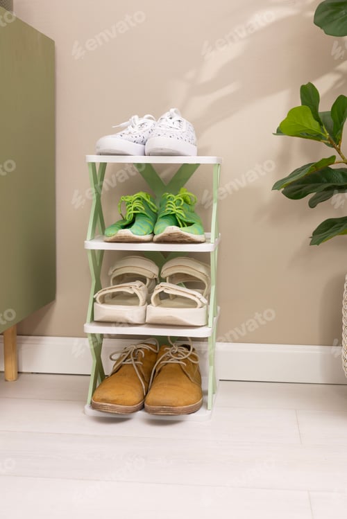 Preview: Stylish interior of modern hall with shoes on stand