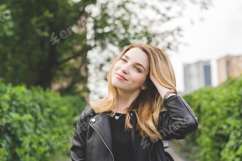 Preview: Woman in Urban Park with Leather Jacket