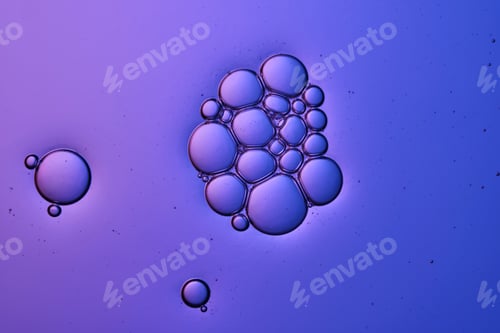Preview: Bubbles in shampoo or shower gel. Texture on a purple background.