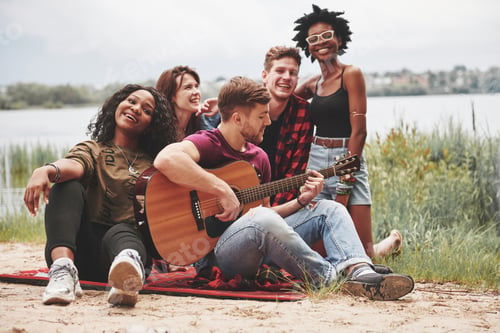 Preview: Closeness of people. Group of friends have picnic on the beach. Youth have fun at weekend time