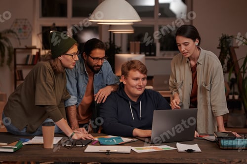 Preview: Business people working on laptop