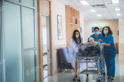 Preview: Emergency Department: Doctors, Nurses and Paramedics Run and Push Gurney