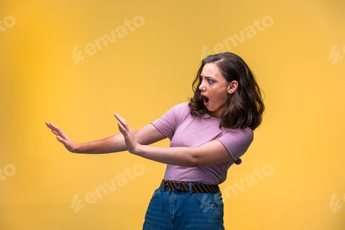 Preview: Young girl is scared and trying to stop something