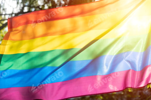 Preview: LGBTQ rainbow colors flag, a symbol for the homosexual community, waving and shines by sunlight