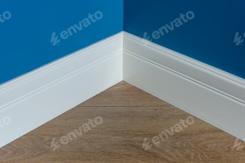Preview: Moulding in the corner. Blue Matte Wall with laminate immitating oak texture