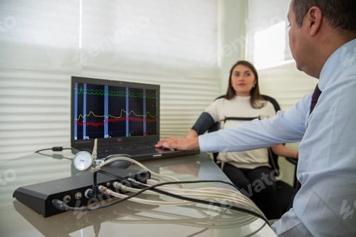 Preview: woman in polygraph test with measuring devices